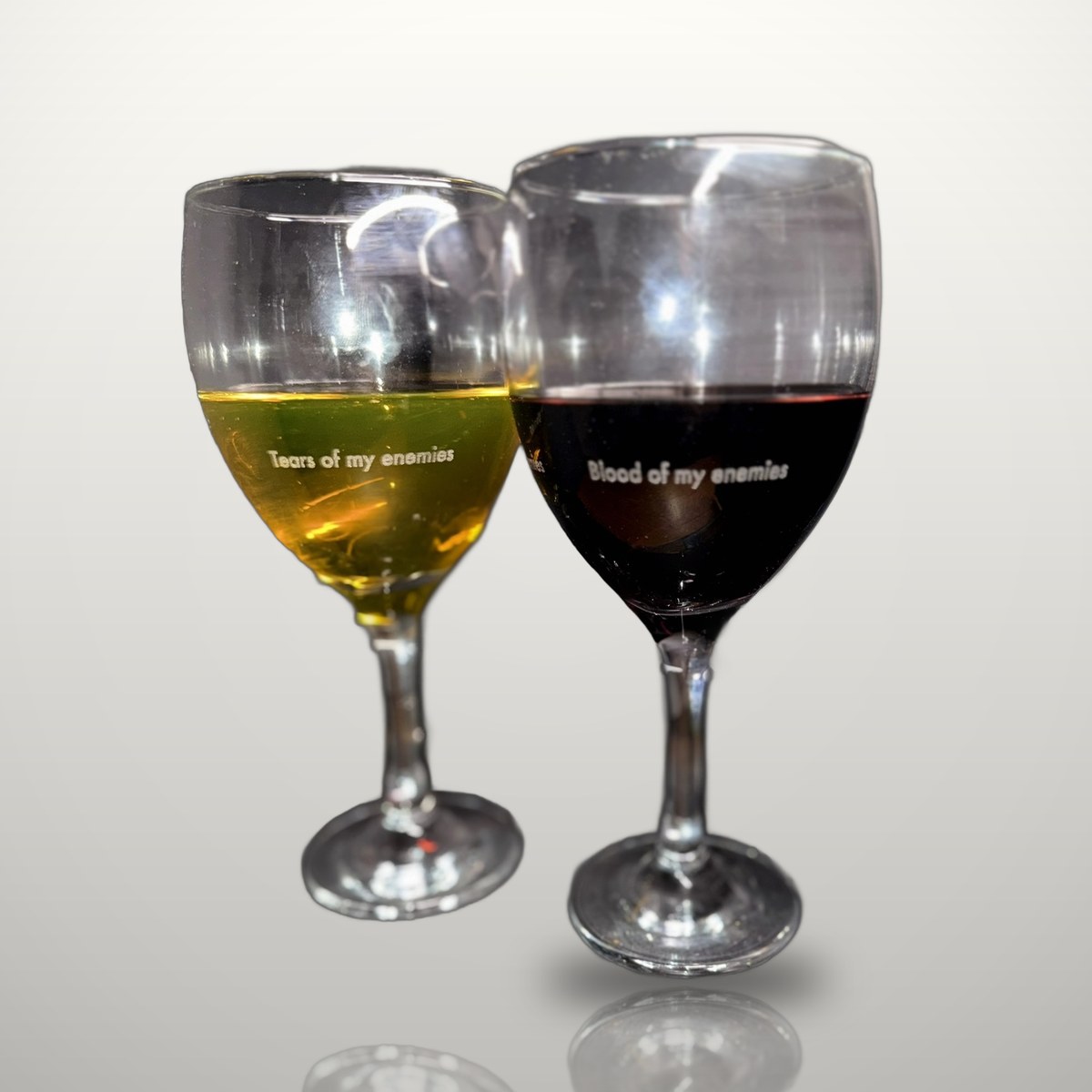 Engraved wine glasses, a matched pair