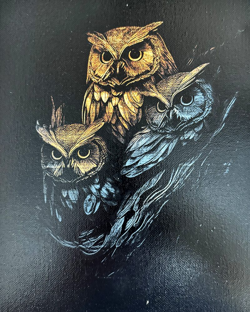 Three owls — a two-colour reveal in amber and blue