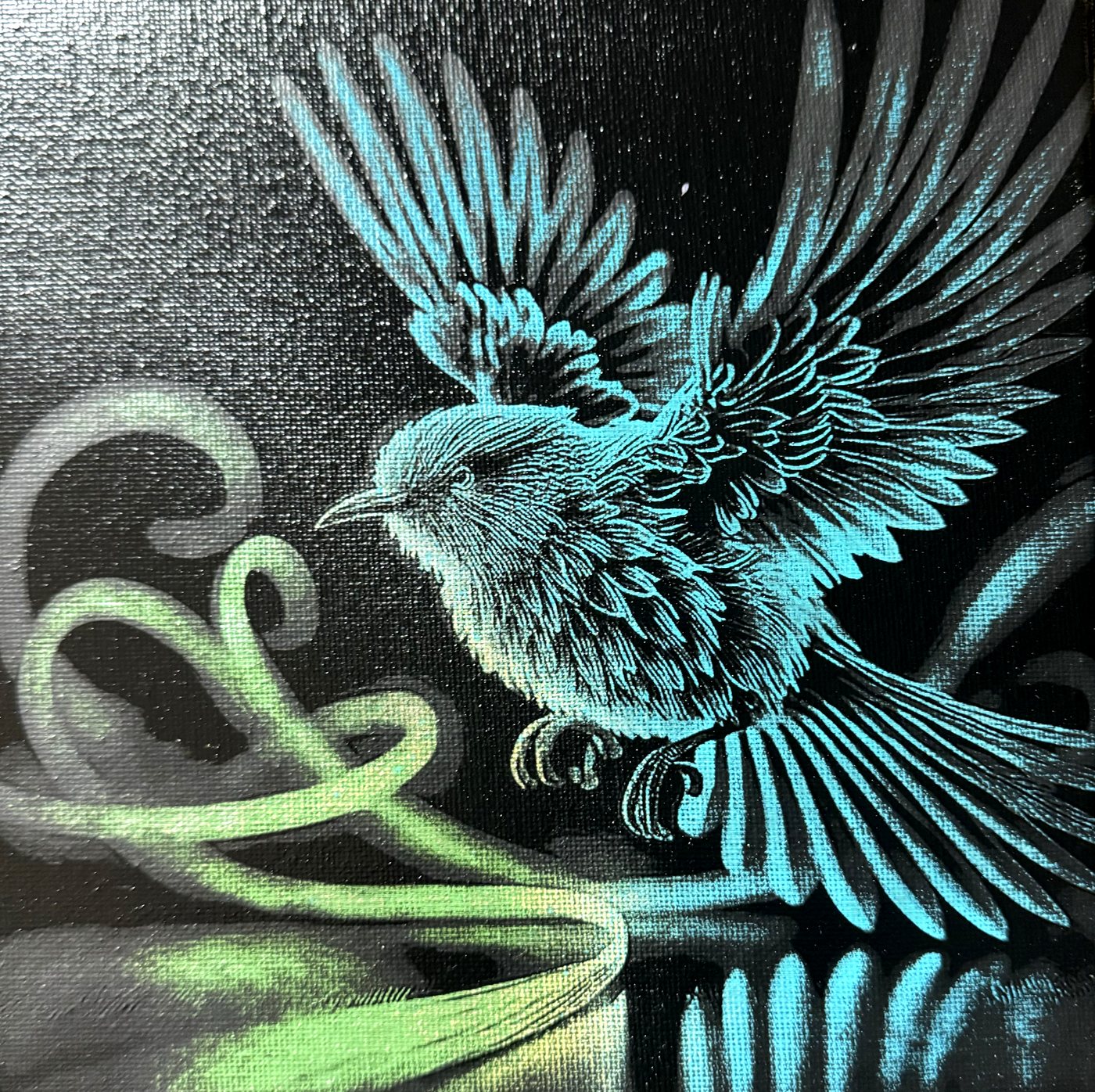 Pīwakawaka in flight — teal fantail with green koru, painted then laser-revealed on black canvas