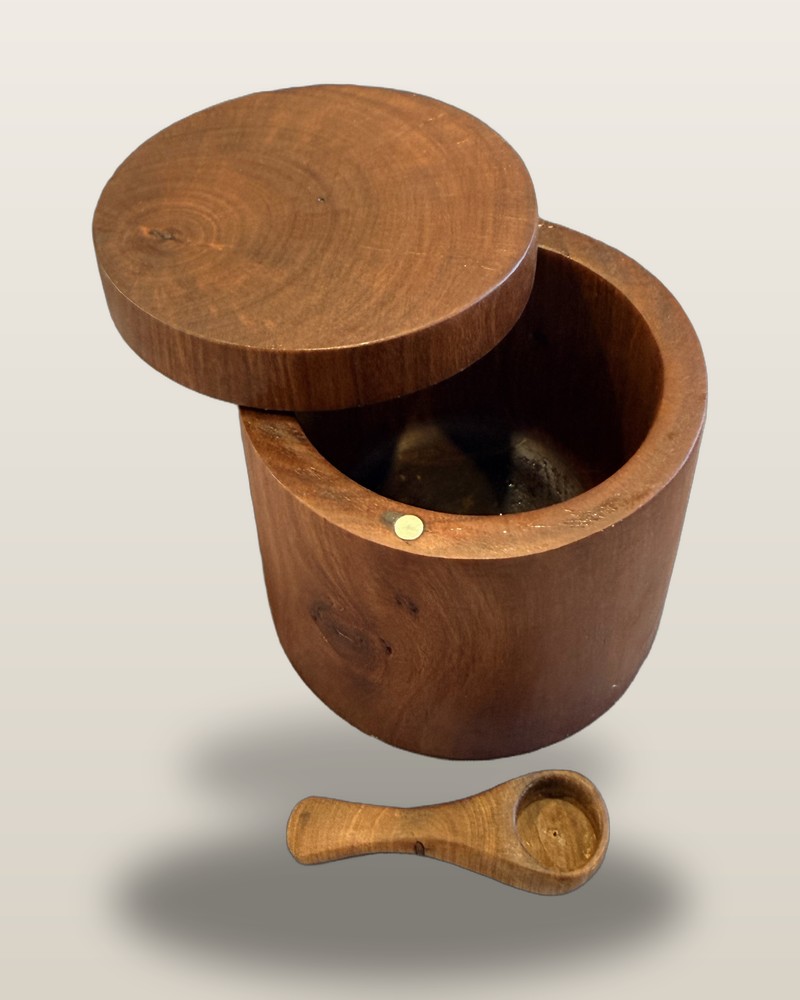 Pōhutukawa salt pig, lid off, with a hand-carved spoon